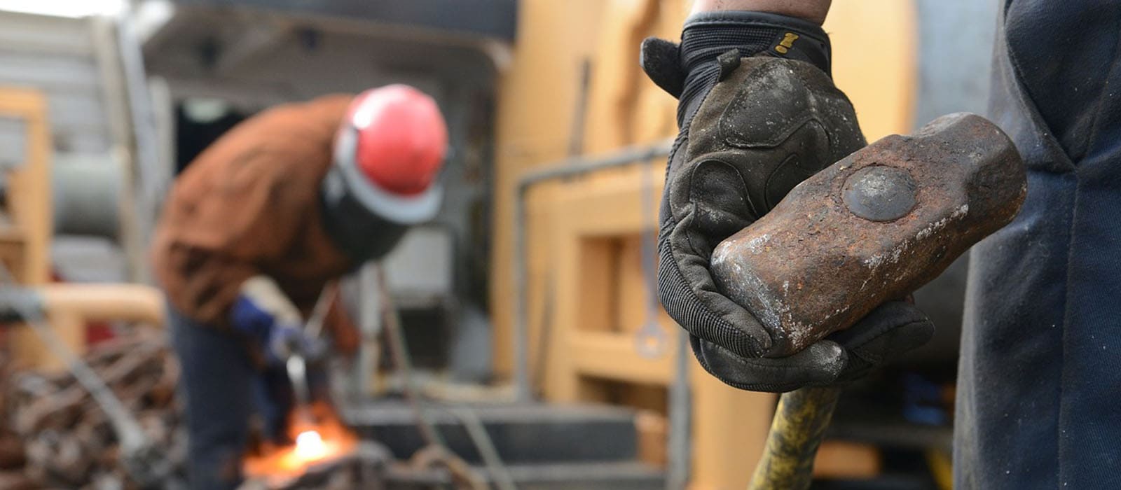 construction worker holding hammer